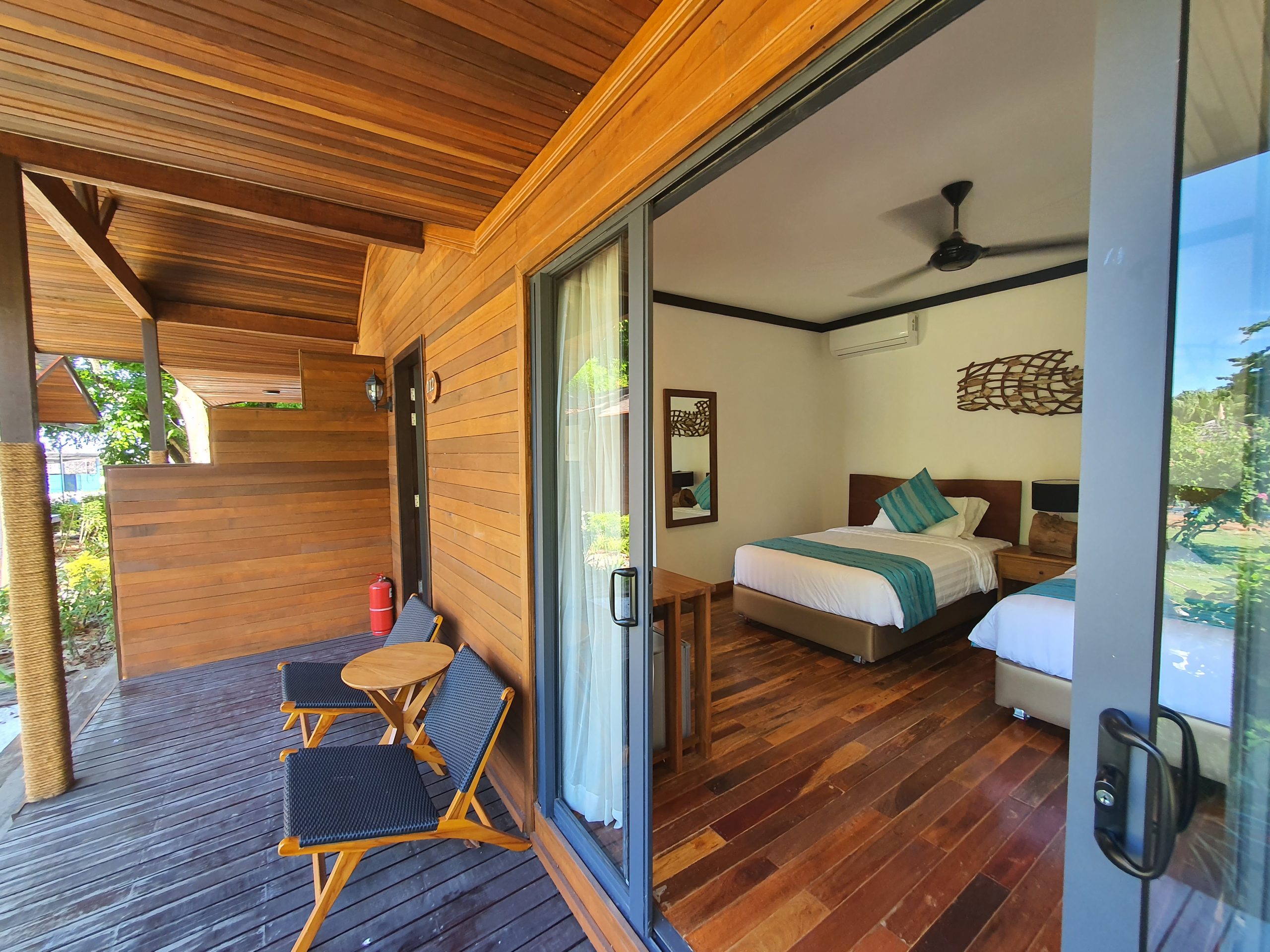 executive beach chalet interior borneo divers mabul resort