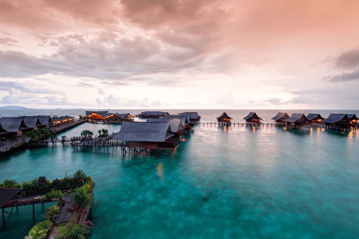 overwater chalet at sipadan kapalai dive resort at sunset
