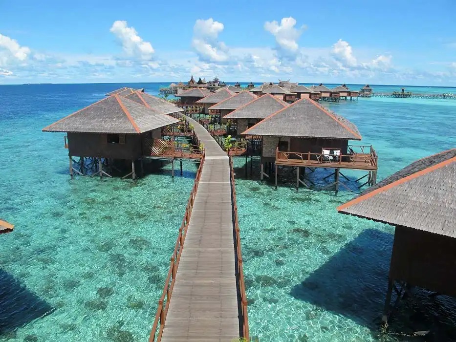 mabul island village and jetty from the water