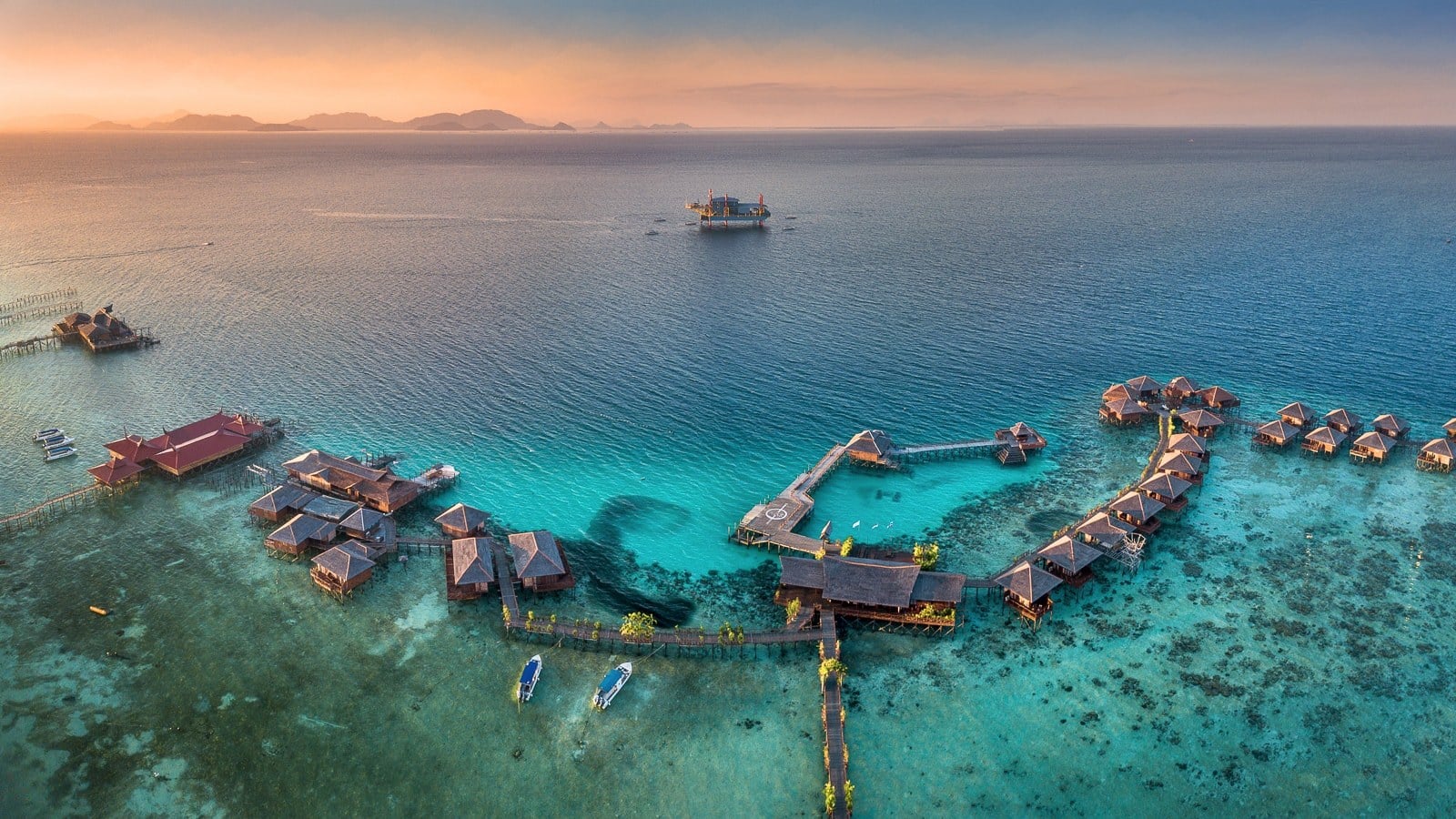 mabul island resorts aerial with kapalai in distance